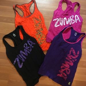 Lot of 4 Zumba fitness tank tops